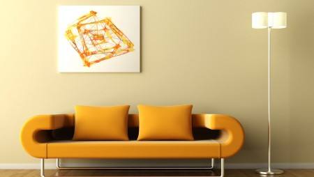 orange couch lamp and picture